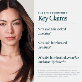 VIRTUE conditioner being applied to damp hair for frizz reduction