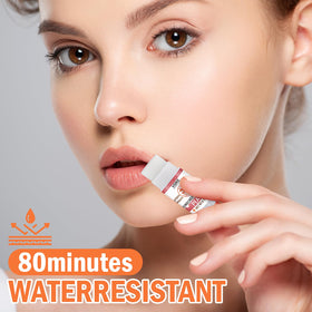 VISRIE outdoor usage image applying lip balm at beach for sun protection benefit
