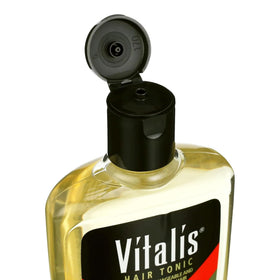 Vitalis in hands applying a small amount for easy, non-greasy styling