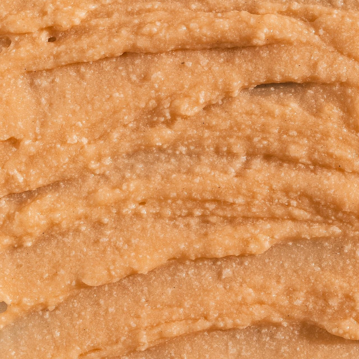VITAMINS AND SEA BEAUTY woman applying scrub demonstrating gentle cleansing