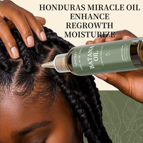 Vivccon Batana oil pouring from bottle showing rich texture and sheen