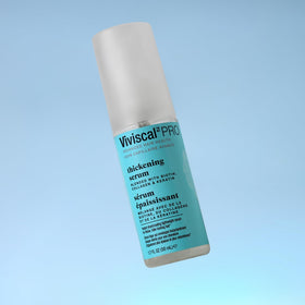 Viviscal texture droplet close-up showing lightweight serum and absorbency