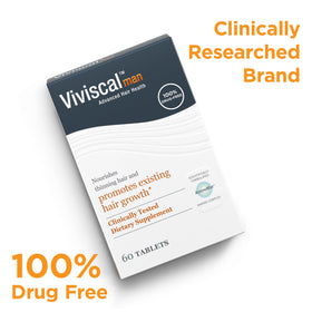 Viviscal tablets in hand for scale and clear dose visual to aid user understanding