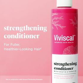 Viviscal dispensing conditioner texture demonstrating smooth application benefit