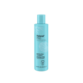 Viviscal shampoo pump and label closeup highlighting professional-strength formula