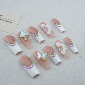 vlazryk almond tip with flowers and butterflies offering ornate design appeal
