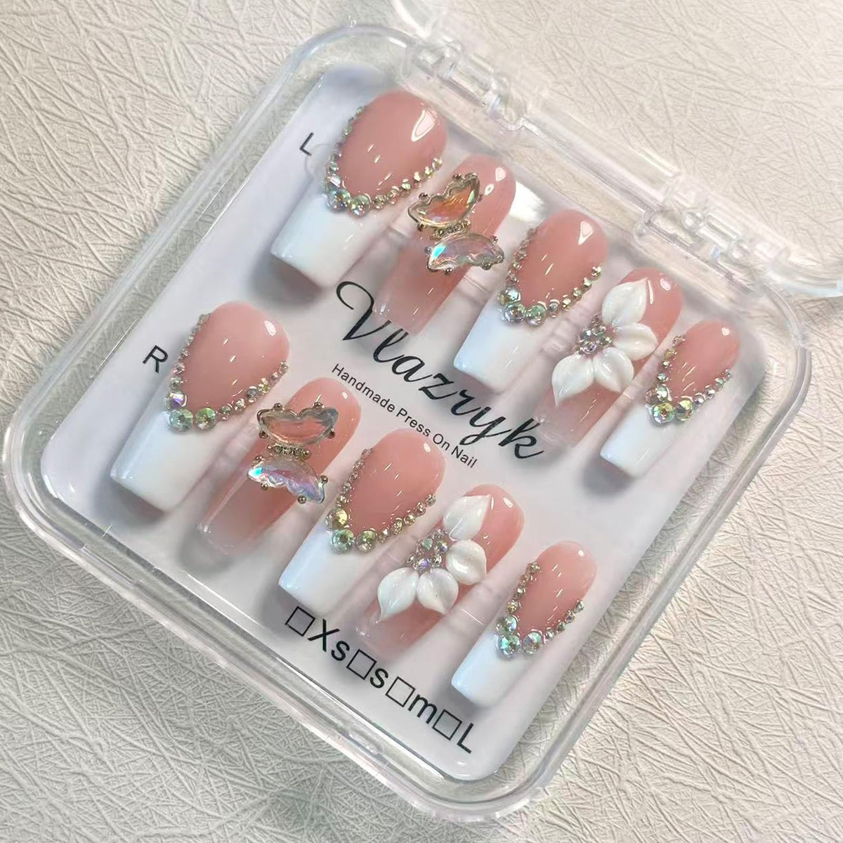 vlazryk front packaging showing elegant press-on nails for quick salon look
