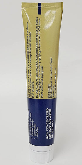 VO5 bottle held in hand conveying 1.5 oz travel size convenience