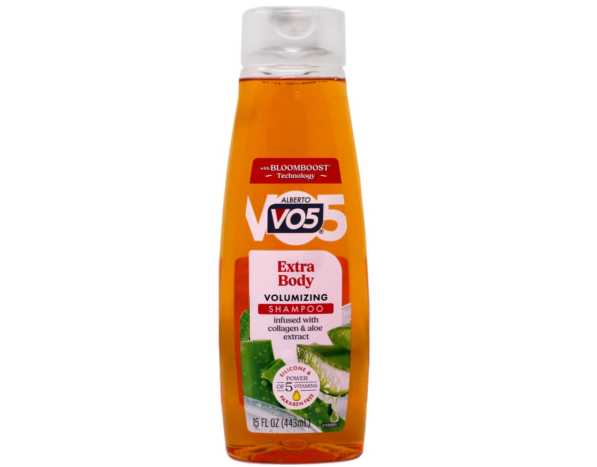 VO5 bottle held in hand showing 15 oz size and travel-friendly supply