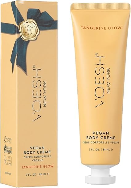 VOESH tangerine tube applied to hand illustrating fast non-greasy hydration