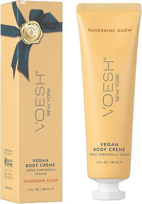 VOESH tangerine tube applied to hand illustrating fast non-greasy hydration