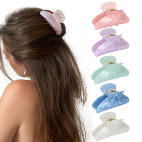 VRbeatter front view of five medium claw clips, easy styling