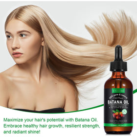 Massaging VXHDAG Batana oil onto skin and nails for hydration and softness