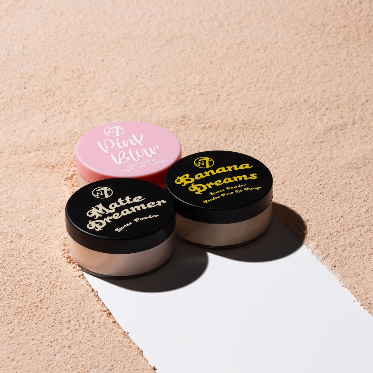 W7 vanity scene with powders and brushes showing everyday beauty styling benefit