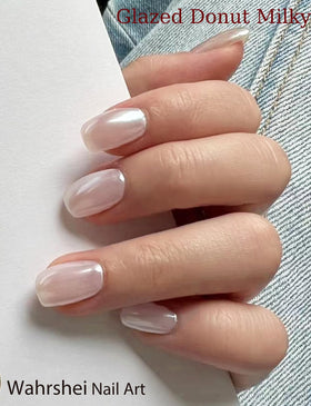Wahrshei nails in use showing glazed milky manicure for salon look at home