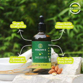 WALARA bottle next to coin for scale illustrating 4oz premium vitamin E oil