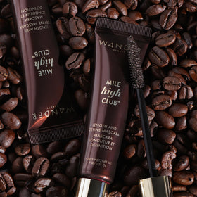 Wander Beauty mascara held in hand to show size and travel-friendly 0.31 oz convenience