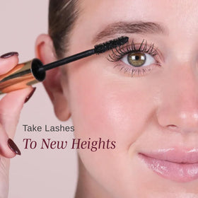 Wander Beauty open wand brush poised to coat lashes for lift