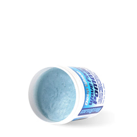 WAVEBUILDER pomade texture on fingers demonstrating smooth application and control