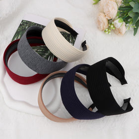 Wecoe headband styled with cozy sweater suggesting seasonal outfit coordination
