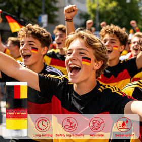 WEEMAY fan applying Germany cheek stripes for fast game-day spirit