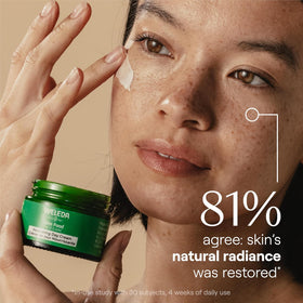 Applying Weleda cream to cheek demonstrating lightweight absorption and smooth base benefit