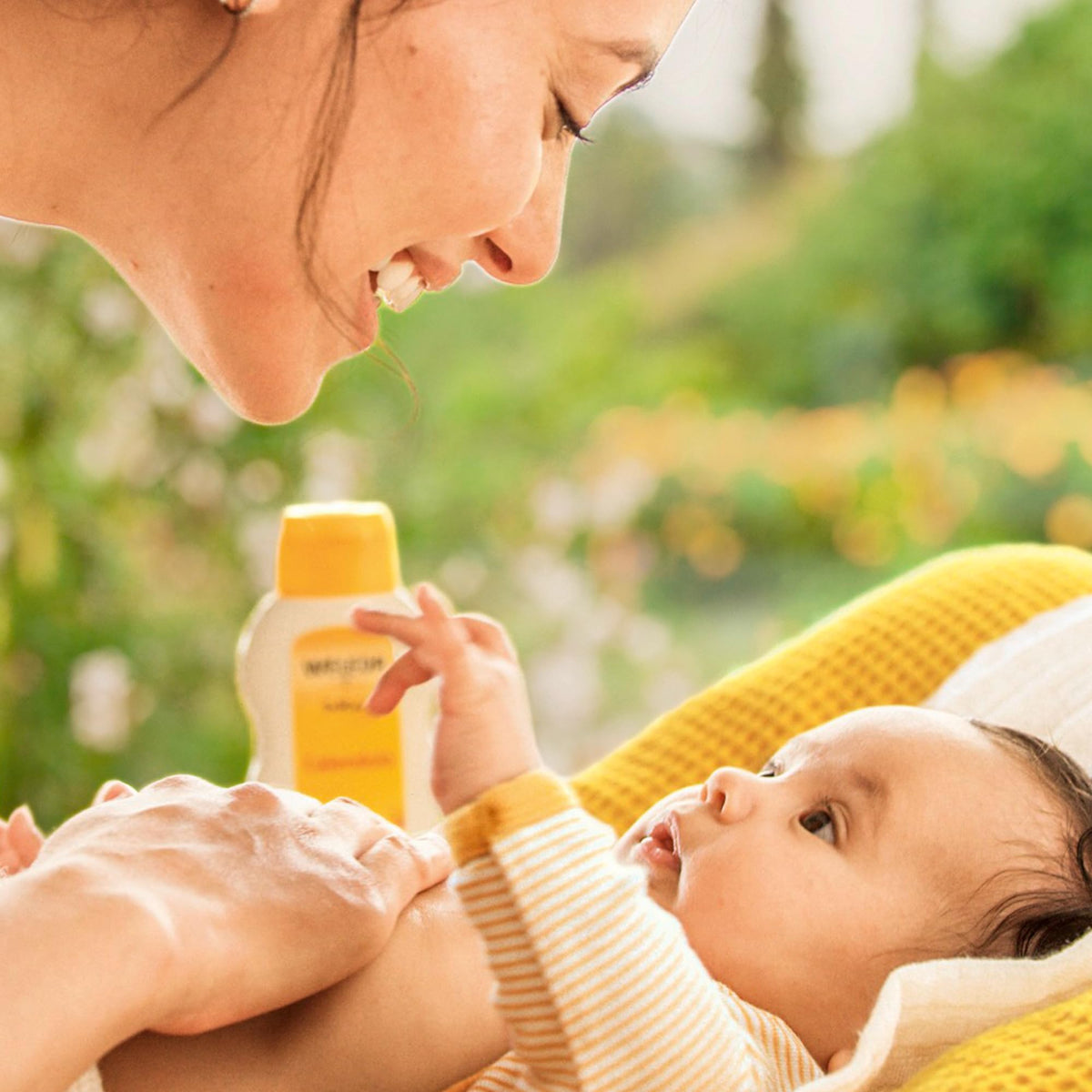 Weleda lotion texture close-up displaying smooth, fast-absorbing formula