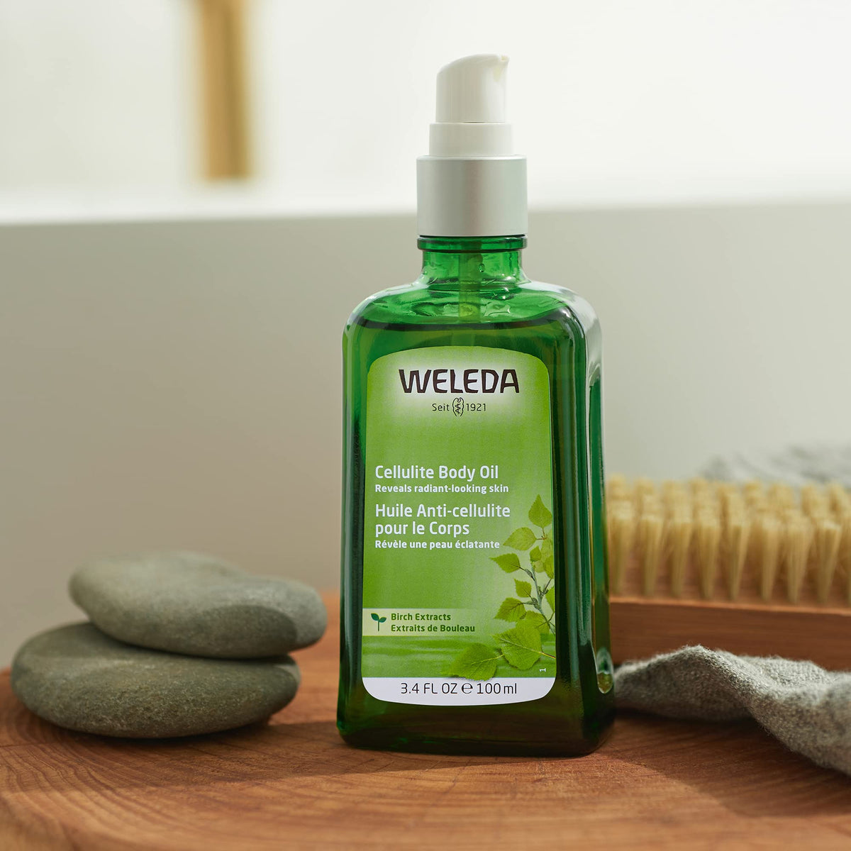 Weleda birch oil texture drop on skin highlighting light absorption and nourishing feel