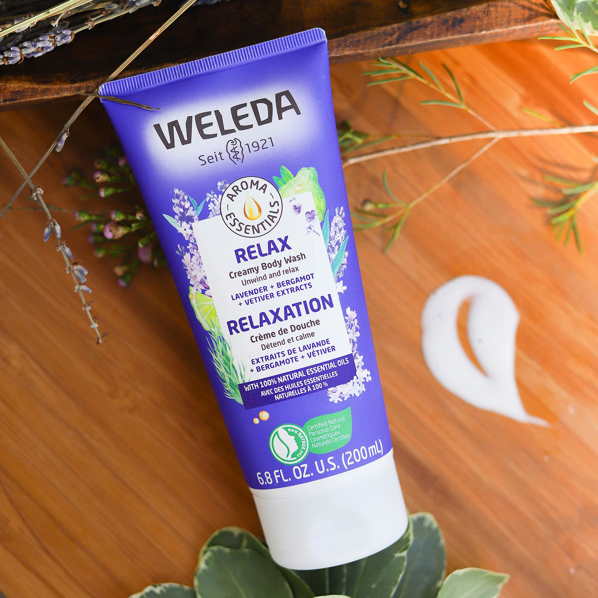 Weleda bottle placed on shower shelf illustrating ready-to-use benefit