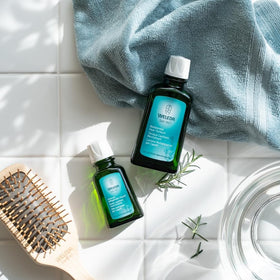 Weleda tonic poured on palm showing fluid texture and easy distribution benefit