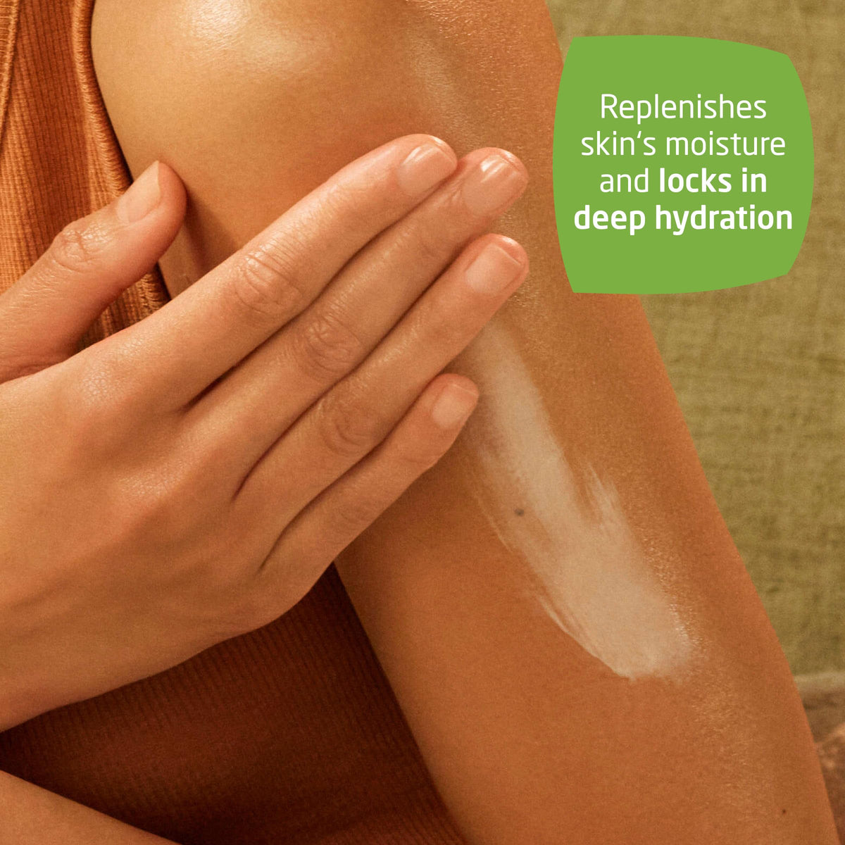 Weleda sea buckthorn lotion texture closeup showing smooth absorption