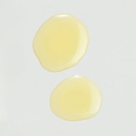 Weleda size and scale with hand indicating convenient 3.4 fl oz travel-friendly