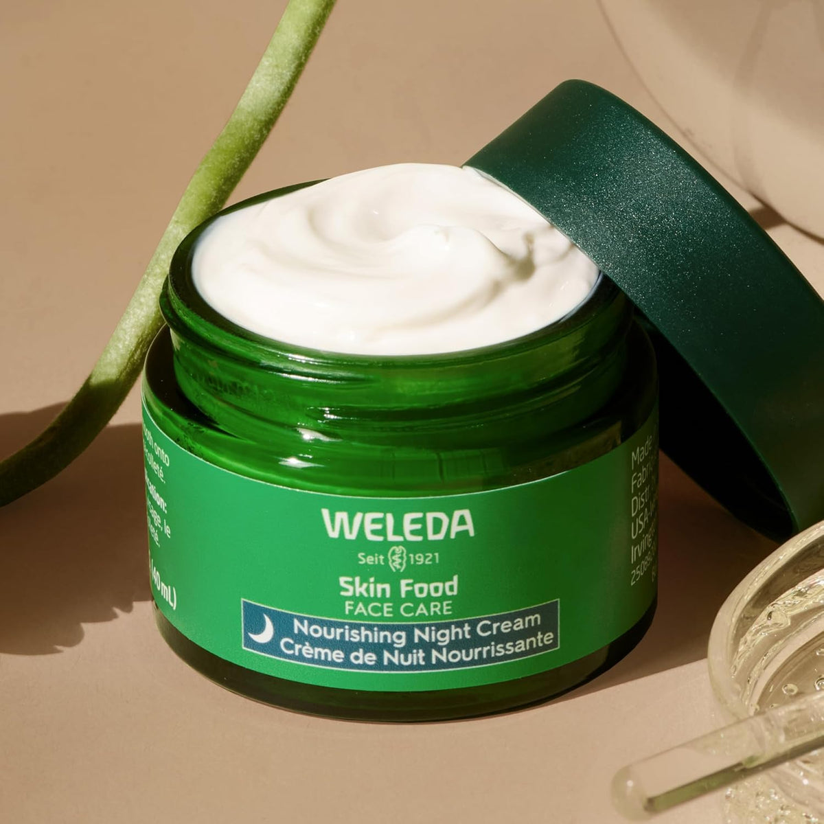 Weleda Skin Food open lid showing cream consistency and nourishing benefit