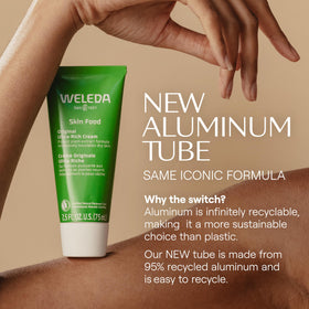 Weleda applying Skin Food to hands to restore softness and comfort