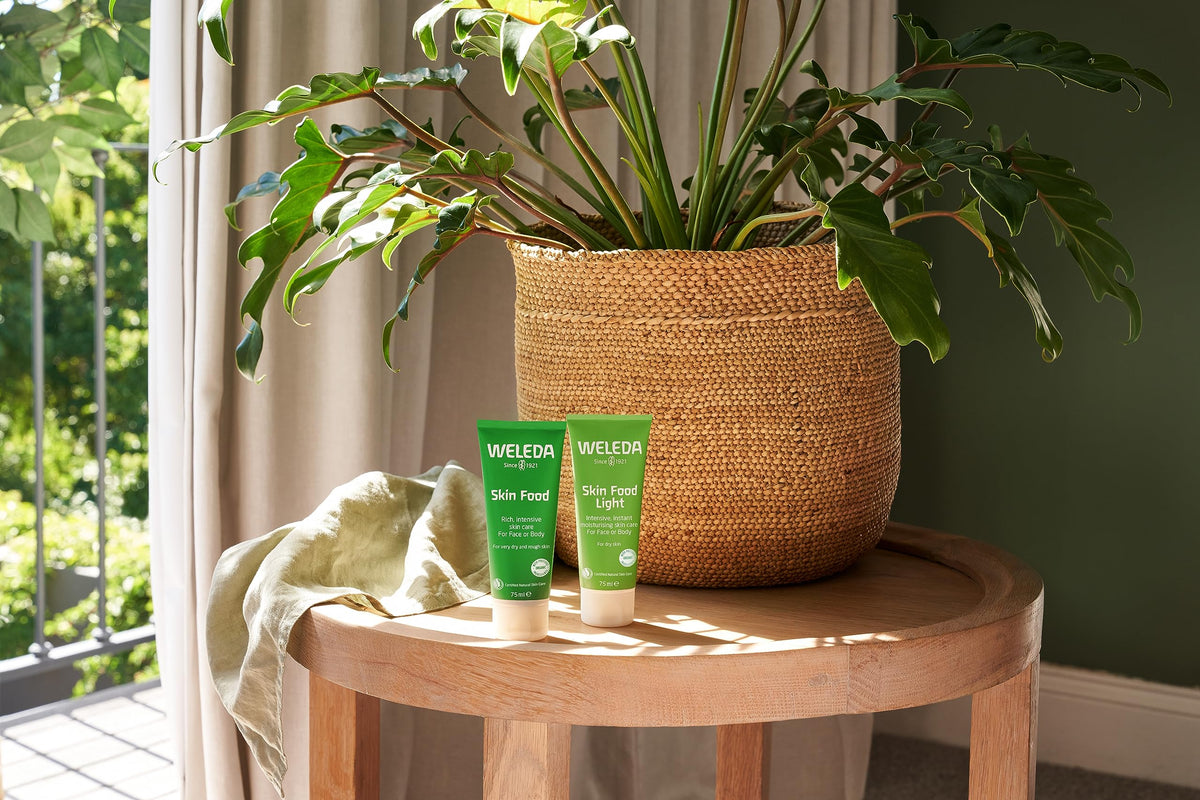 Weleda Skin Food Light inside travel bag showing convenience for on-the-go moisture