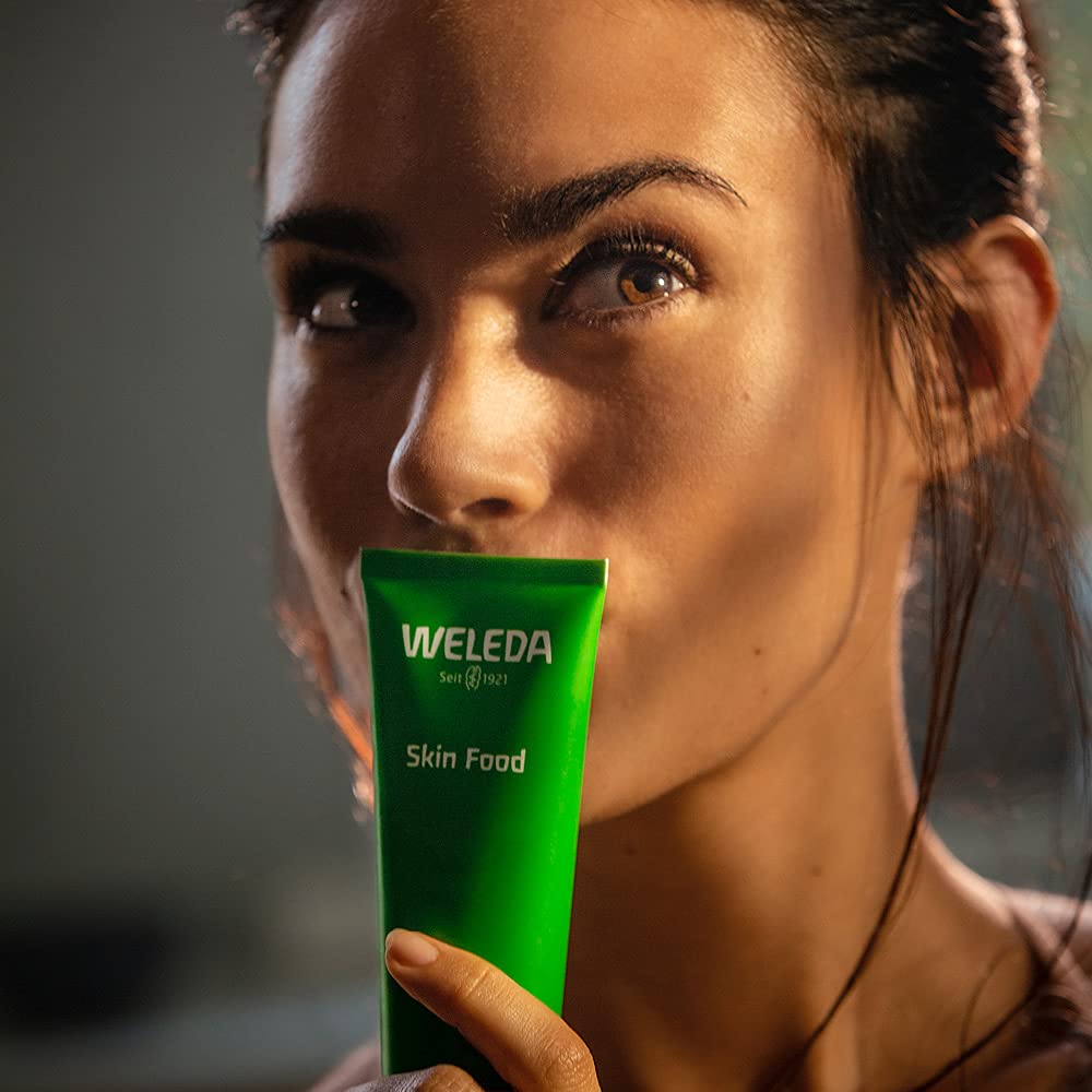 Weleda Skin Food tucked in a pocket demonstrating on-the-go rescue