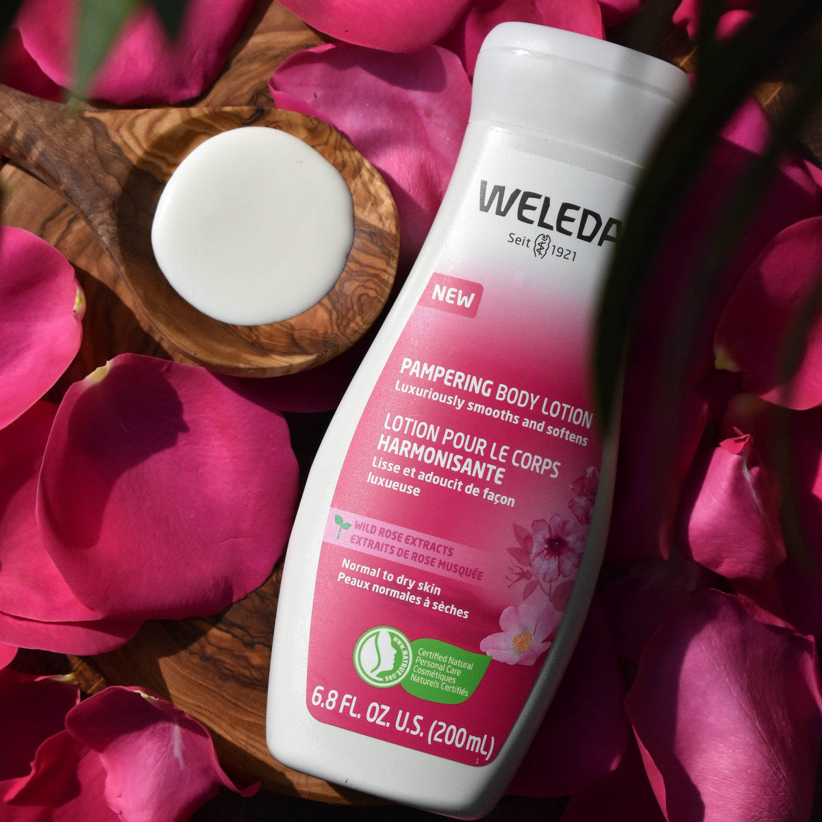 Weleda texture close-up of lotion demonstrating smooth, fast-absorbing consistency