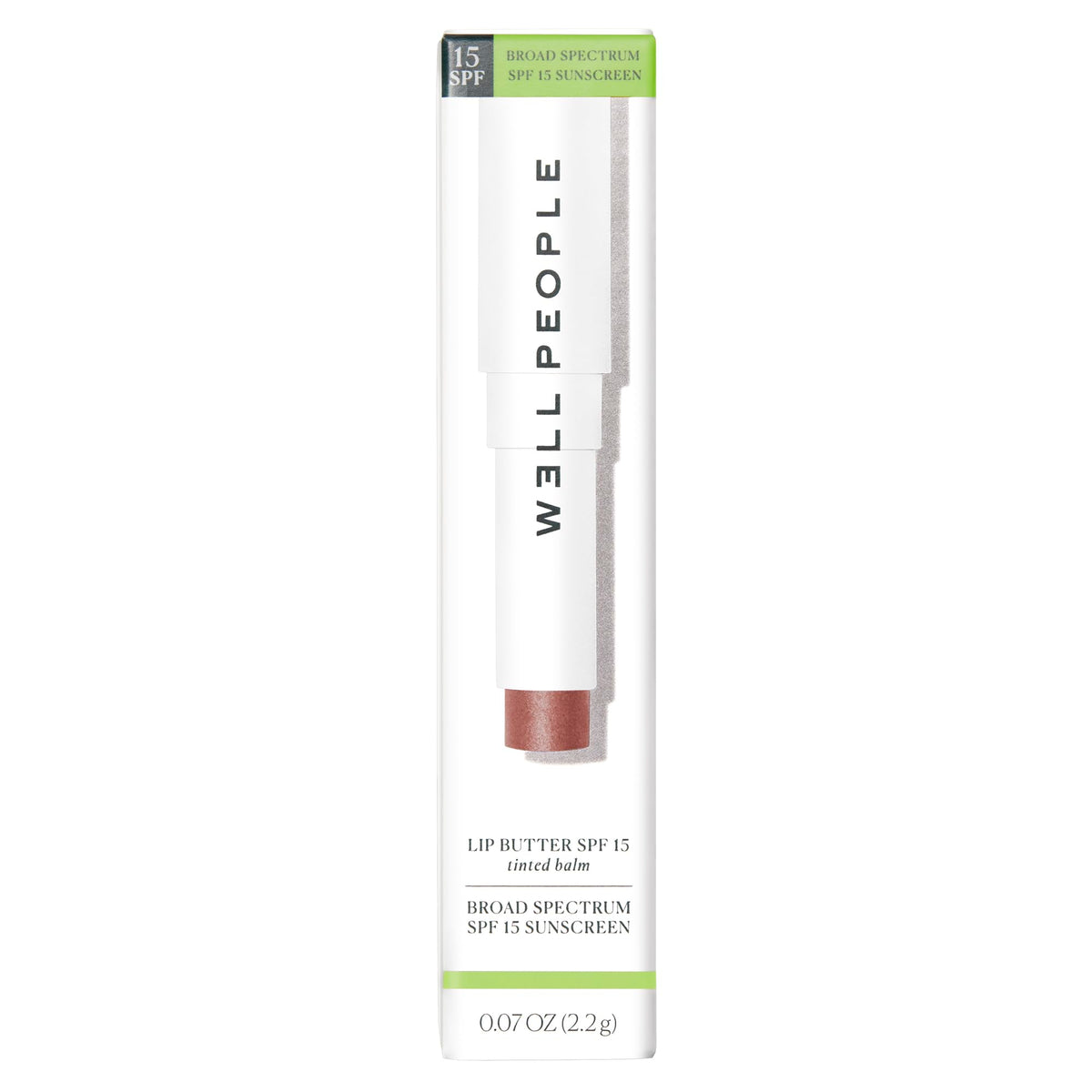 Well People Afterglow tube beside everyday items showing portable sun protection