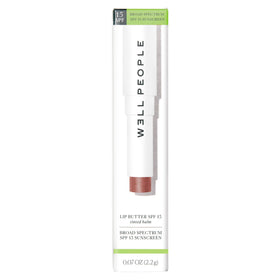 Well People Afterglow tube beside everyday items showing portable sun protection