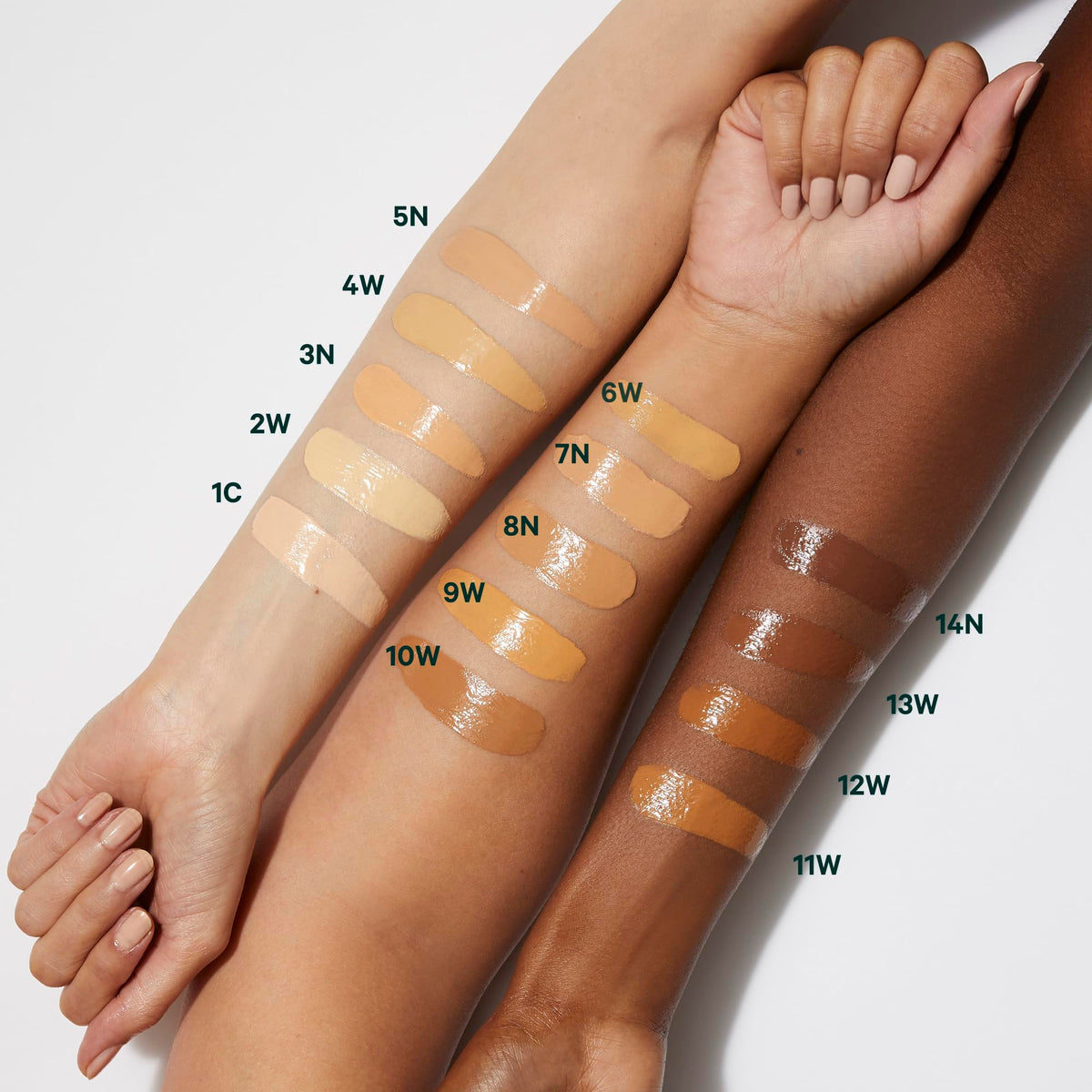 Well People swatches on arm showing 1C tint and buildable coverage for natural finish