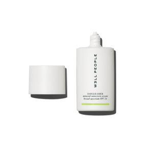 Well People Daygleamer front bottle view showing clean SPF protection