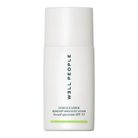 Well People Daygleamer next to coin showing 1.7 oz size and travel-friendly benefit
