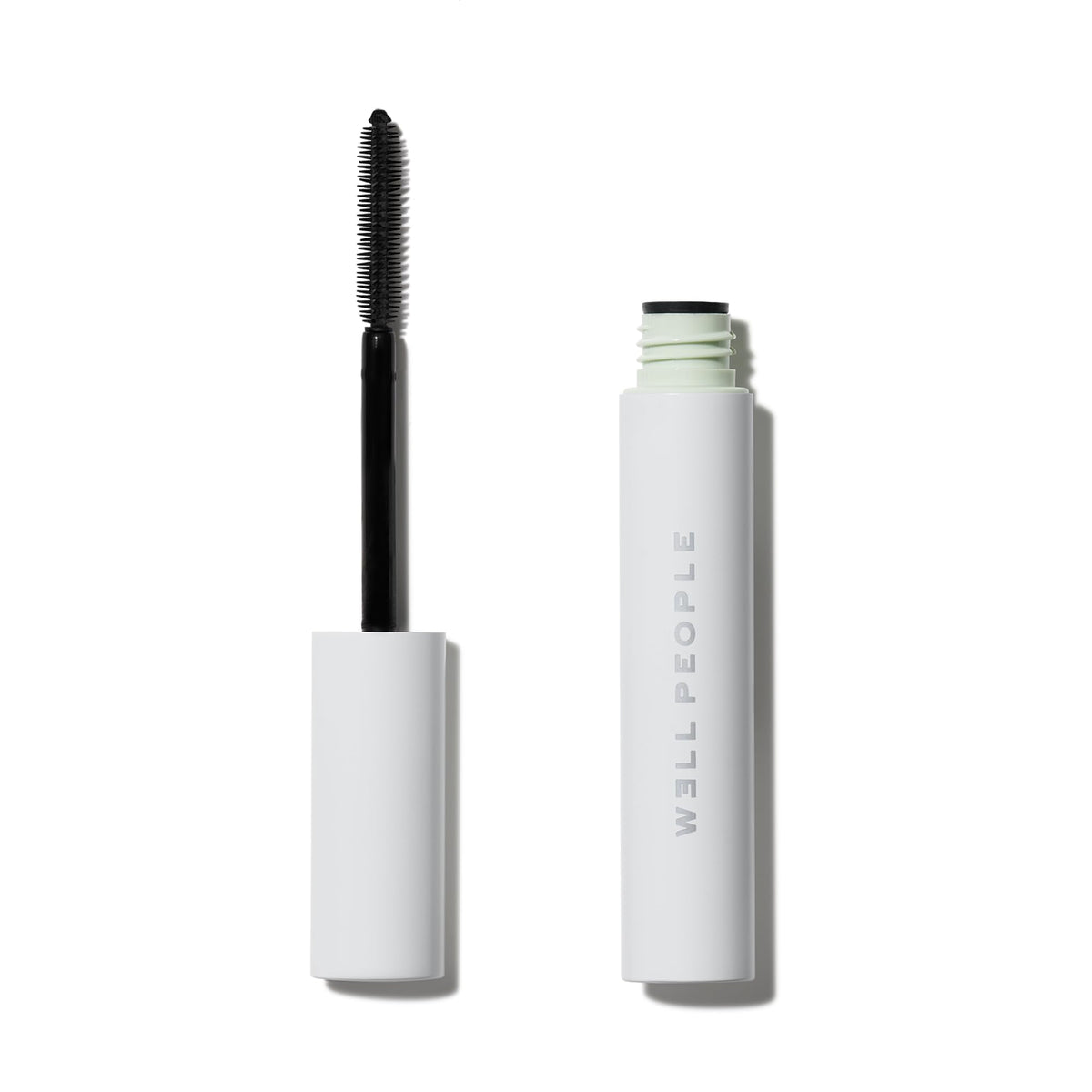 Well People mascara front packaging showing sleek tube and shade benefits