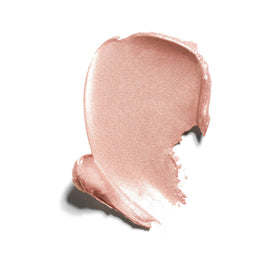 Well People highlighter stick texture close-up revealing creamy finish for smooth blending