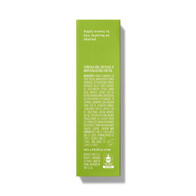 Well People lip oil tucked into a purse illustrating portable touch-up and hydration