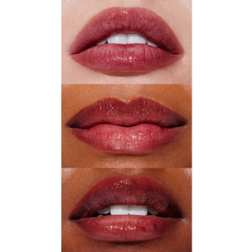 Well People swipe of lip oil on fingertip showing silky texture and quick absorption