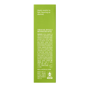 Well People lip oil in a purse setting for on-the-go hydration and glossy touch benefit