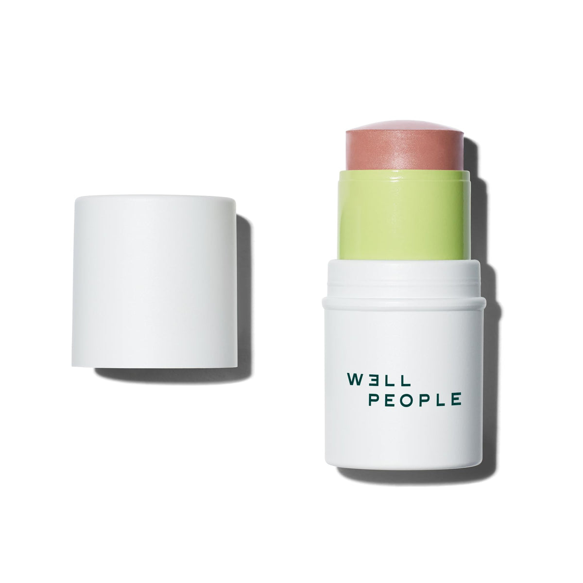 Well People stick front view showing Lychee shade and compact design benefit