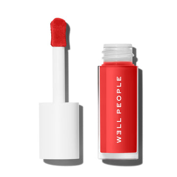 Well People Wildflower front tube showing packaging and coral tint benefit