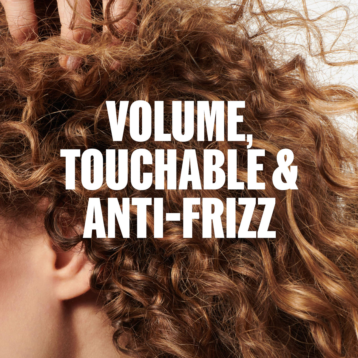 Wella Professionals foam in hand being applied for buildable volume benefit